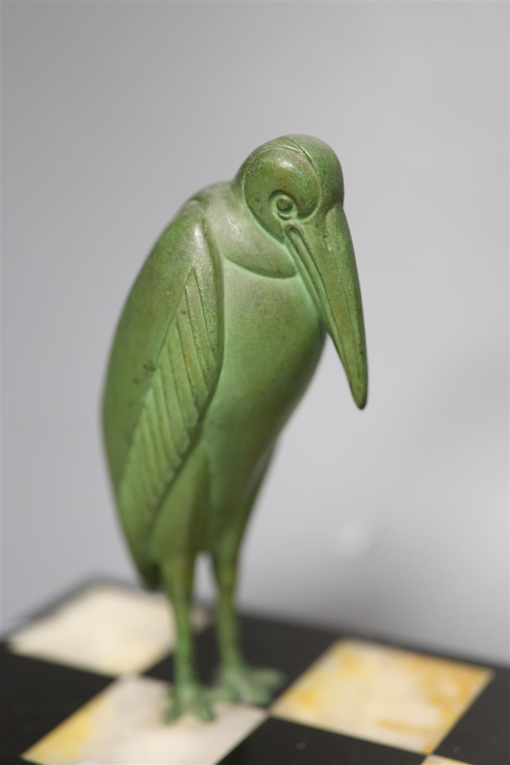 After Dimitre Chiparus (1889-1947), green-patinated spelter figure of two girls fascinated by a Marabou stork